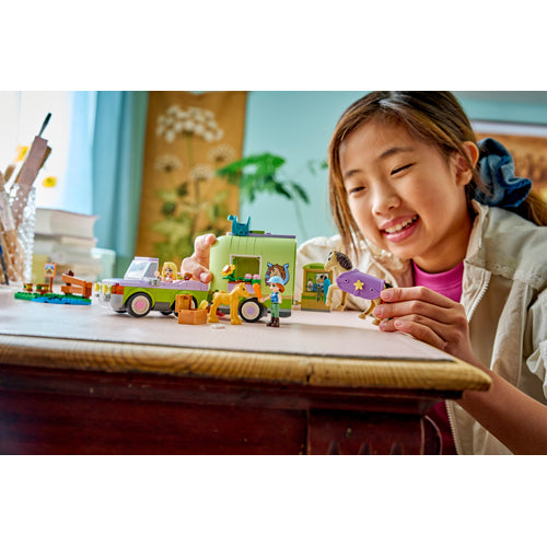 The LEGO® Group Friends Horse & Baby Foal Trailer Set 42695