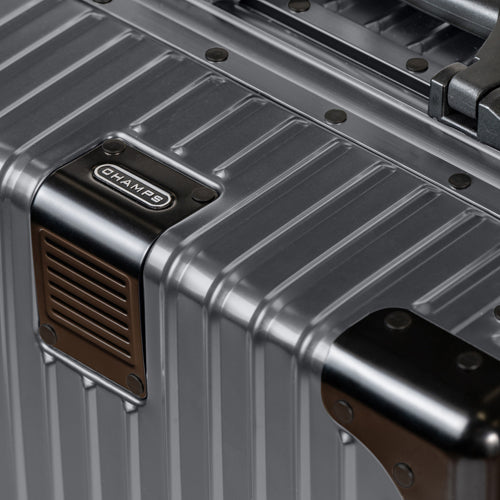 Champs Elite Collection - Hardside Aluminum Carry-on